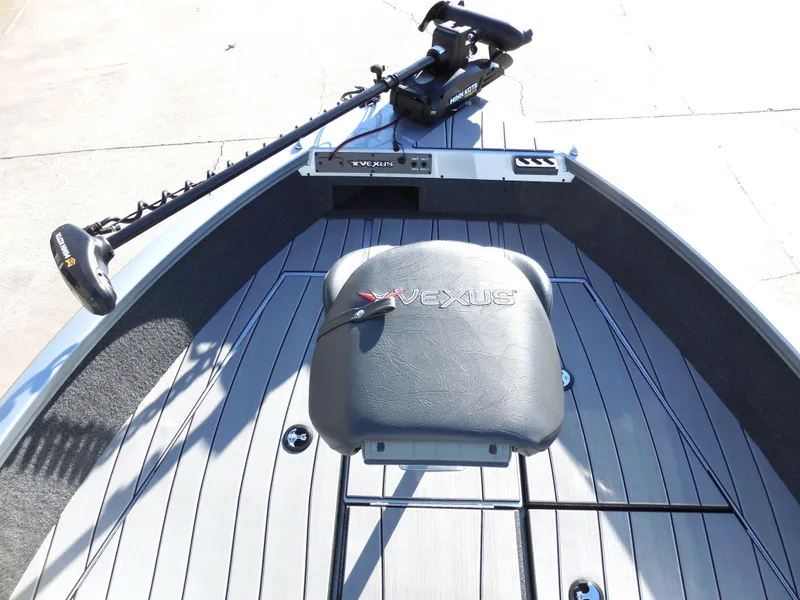 Slide: The Image of 2024 Vexus ADX 180 boat deck with seat and trolling motor. - 5