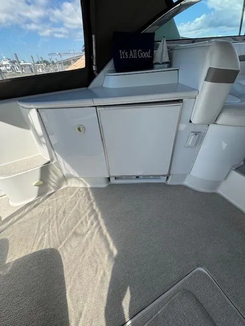 Slide: The Image of Interior of a 2000 Formula 41 PC yacht with white cabinetry and seating. - 14