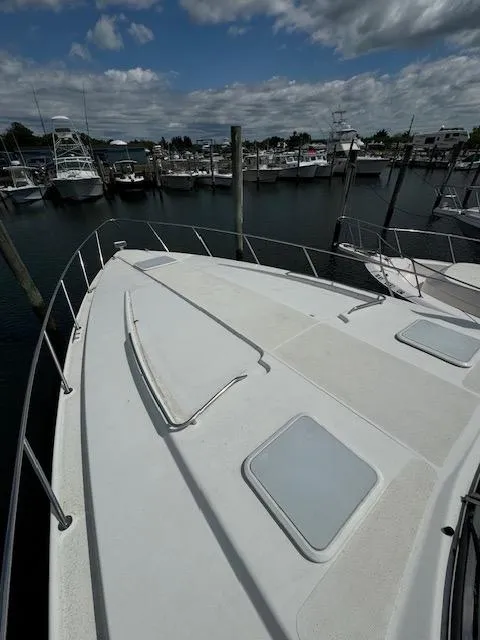 Slide: The Image of 2000 Formula 41 PC boat docked at a marina. - 16