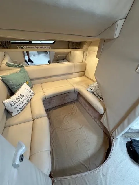 Slide: The Image of Interior of a 2000 Formula 41 PC yacht with beige leather seating. - 21