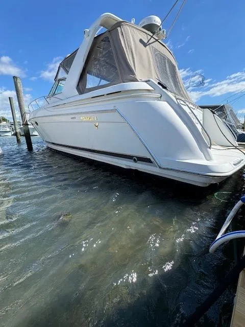 Slide: The Image of 2000 Formula 41 PC yacht docked in clear water. - 3