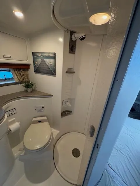 Slide: The Image of Bathroom interior of a 2000 Formula 41 PC yacht with shower and toilet. - 32