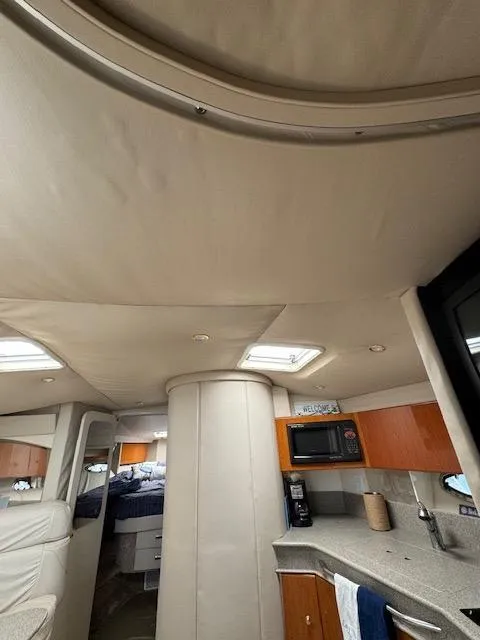 Slide: The Image of Interior of a 2000 Formula 41 PC yacht with modern amenities. - 36