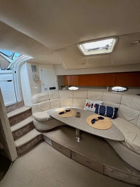 Slide: The Image of Interior of 2000 Formula 41 PC yacht with cozy seating and dining area. - 37