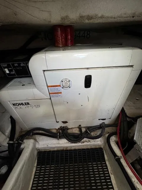 Slide: The Image of Kohler generator in the engine room of a 2000 Formula 41 PC boat. - 38