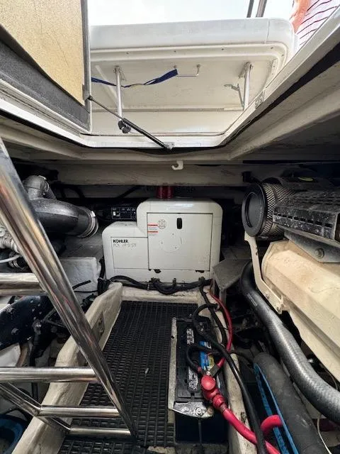 Slide: The Image of Engine compartment of a 2000 Formula 41 PC boat with Kohler generator. - 47