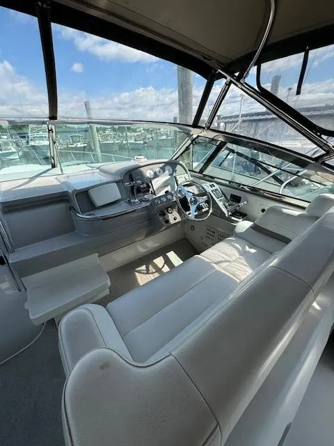 Slide: The Image of 2000 Formula 41 PC boat cockpit with steering wheel and seating. - 9