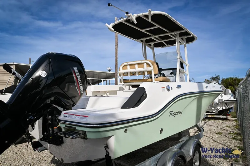 Slide: The Image of 2024 Bayliner T20 boat with Mercury outboard motor on trailer. - 1