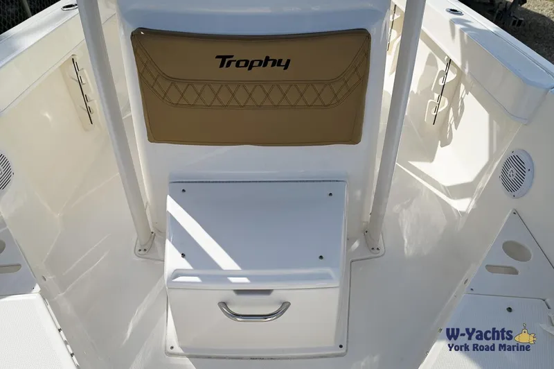 Slide: The Image of 2024 Bayliner T20 Trophy boat interior with storage compartment and seating. - 10