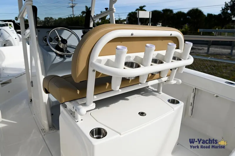 Slide: The Image of 2024 Bayliner T20 boat interior with rod holders and steering console. - 17