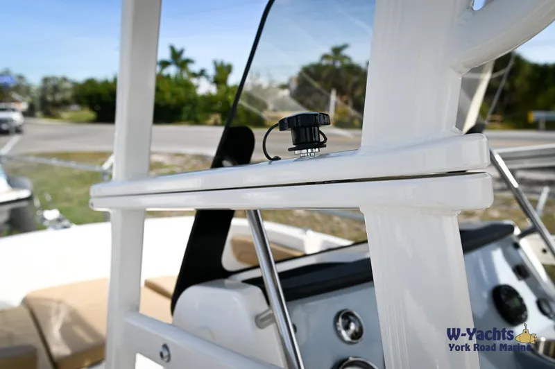 Slide: The Image of Close-up of the 2024 Bayliner T20 boat's helm and console area. - 23