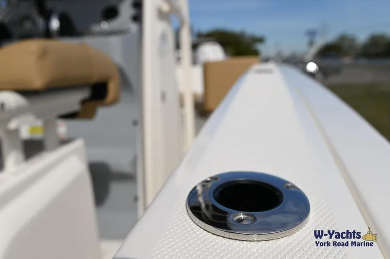 Slide: The Image of Close-up of 2024 Bayliner T20 boat's deck with rod holder. - 24