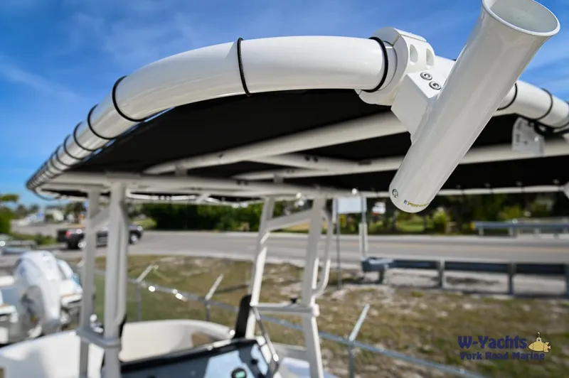 Slide: The Image of 2024 Bayliner T20 boat with T-top and rod holder. - 27