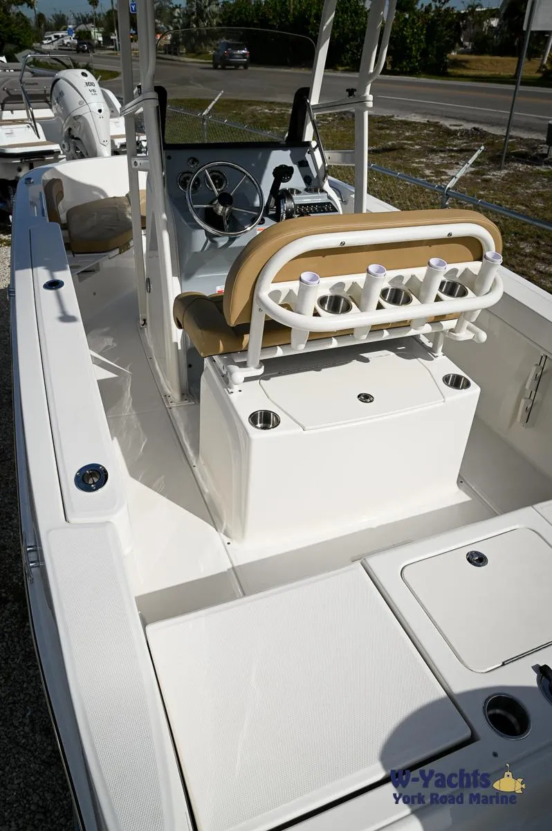 Slide: The Image of 2024 Bayliner T20 boat interior with seating and storage compartments. - 4
