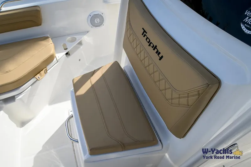 Slide: The Image of 2024 Bayliner T20 boat interior with tan cushioned seats. - 9