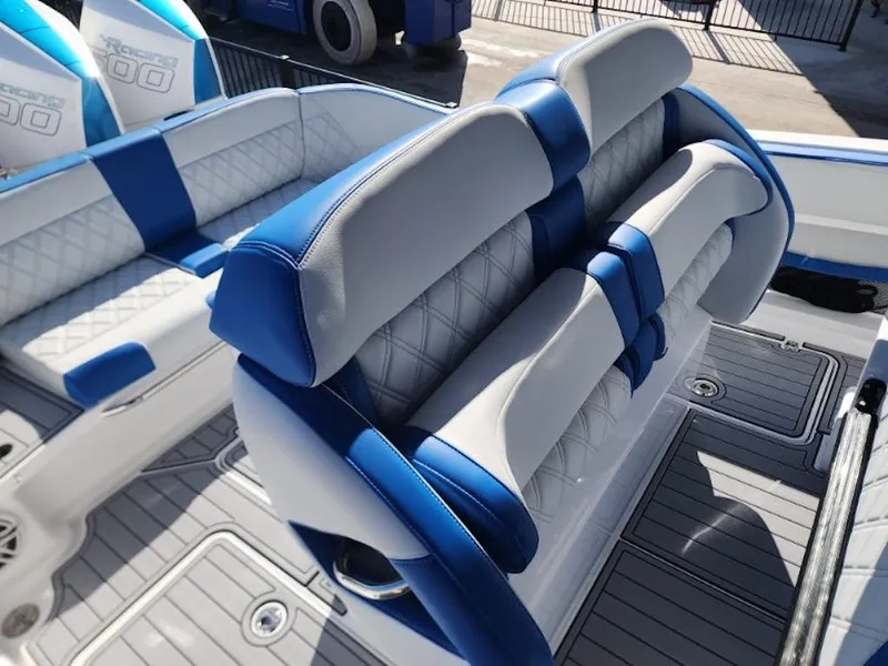 Slide: The Image of 2024 Nor-Tech 400 Supersport boat interior with blue and white seating. - 13