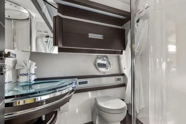Slide: The Image of Luxurious bathroom in 2009 Azimut 68S yacht with modern fixtures and elegant design. - 14