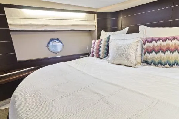 Slide: The Image of Luxurious bedroom interior of 2009 Azimut 68S yacht with elegant bedding and decor. - 15