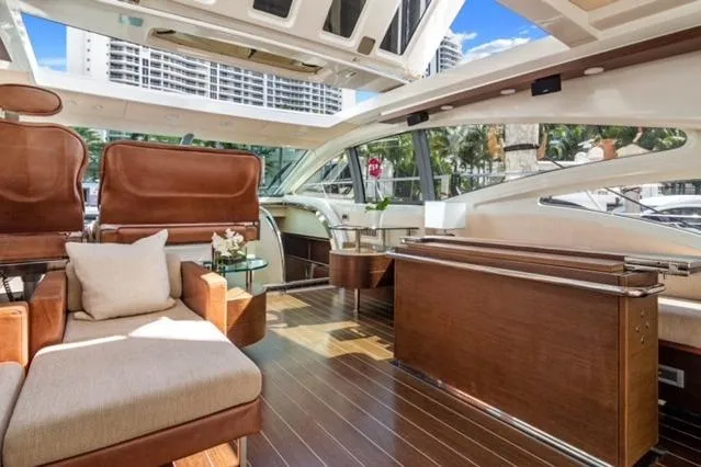 Slide: The Image of Luxurious interior of 2009 Azimut 68S yacht with elegant wood and leather furnishings. - 3