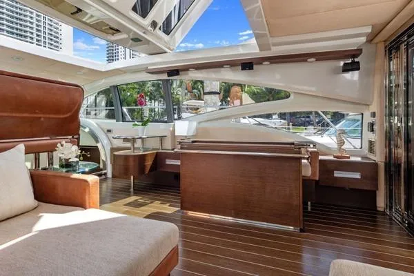 Slide: The Image of Luxurious interior of 2009 Azimut 68S yacht with elegant wood finishes and modern design. - 4
