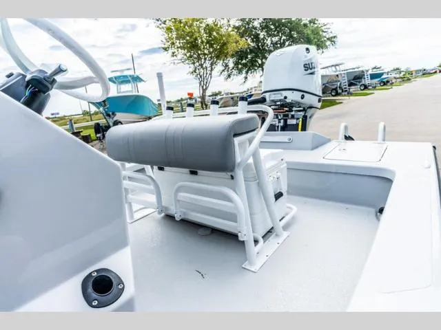 Slide: The Image of 2024 Majek Boats 18 M2 ILLUSION interior with seating and steering wheel. - 5