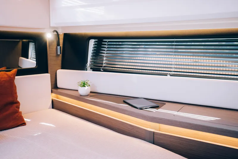 Slide: The Image of Interior of 2025 Wellcraft 38 Explorer yacht with modern design and cozy seating. - 6