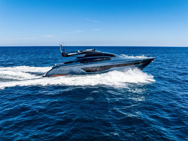 Slide: The Image of Luxury Riva 76' Perseo Super yacht cruising on open sea, 2025 model. - 2