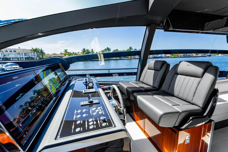 Slide: The Image of Luxurious interior of 2025 Riva 76' Perseo Super yacht with modern dashboard and seating. - 41