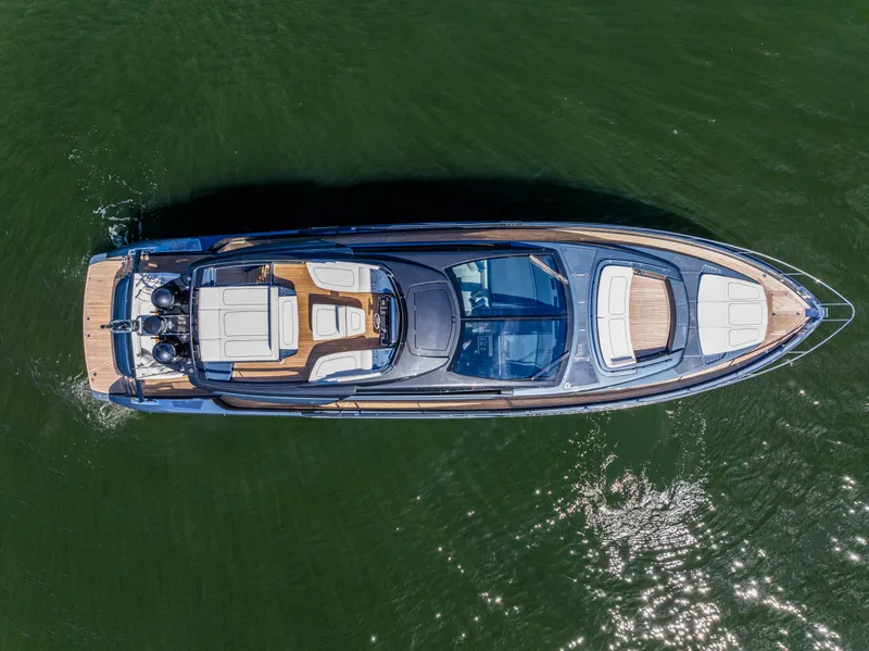Slide: The Image of Aerial view of 2025 Riva 76' Perseo Super yacht on green water. - 6