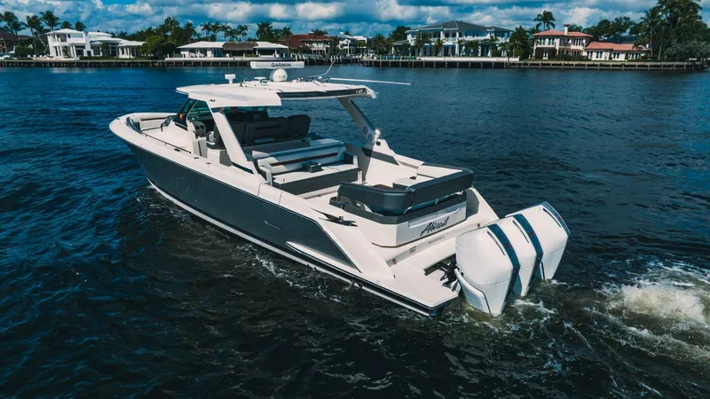 Slide: The Image of 2021 Tiara Sport 43 LS boat cruising on a sunny day. - 12