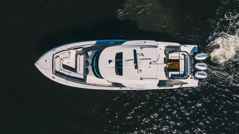 Slide: The Image of Aerial view of a 2021 Tiara Sport 43 LS yacht cruising on water. - 14