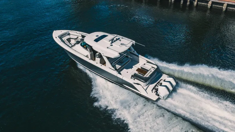 Slide: The Image of 2021 Tiara Sport 43 LS boat cruising on water. - 4