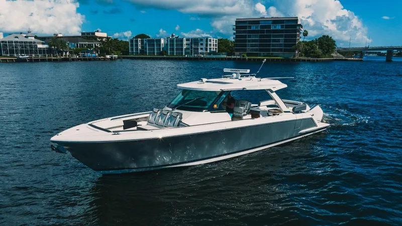 Slide: The Image of 2021 Tiara Sport 43 LS luxury yacht cruising on a sunny day. - 9