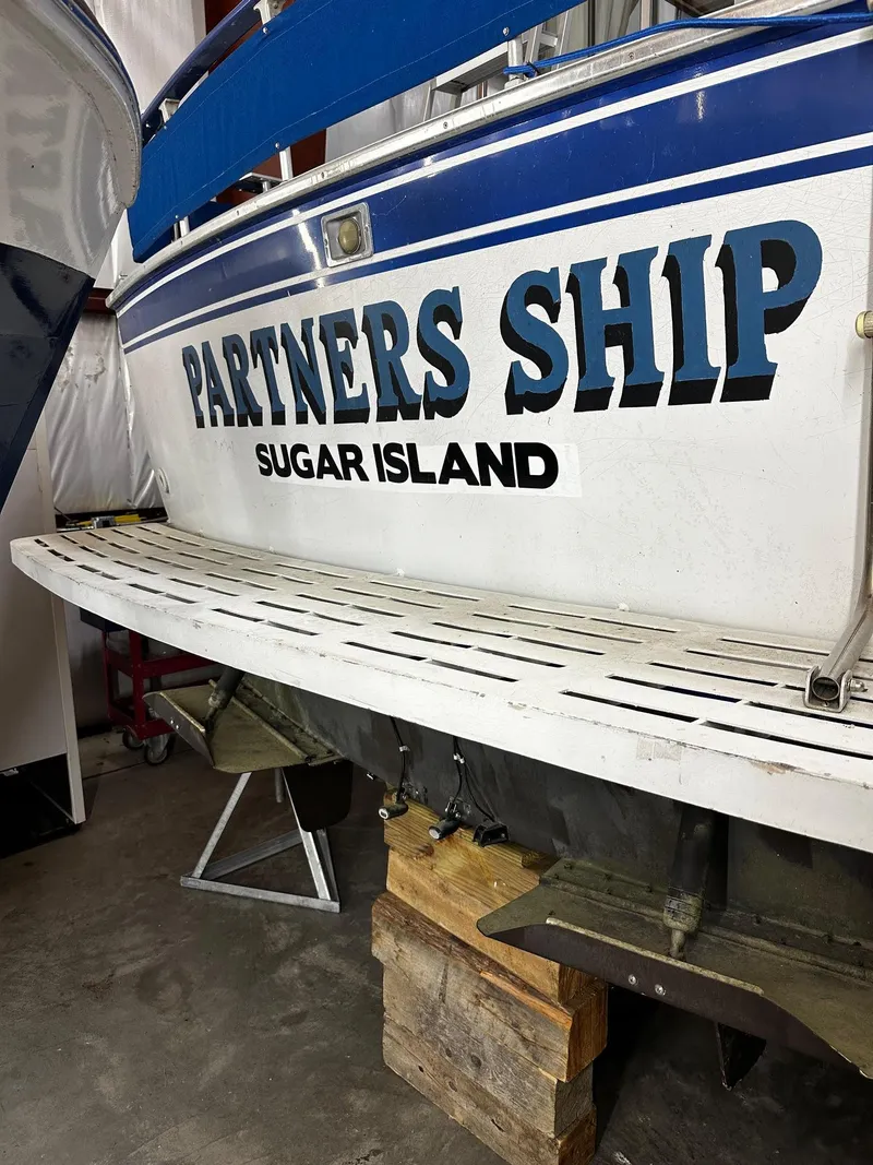 Slide: The Image of 1975 Marinette 32' Cruiser named "Partners Ship" docked at Sugar Island. - 8