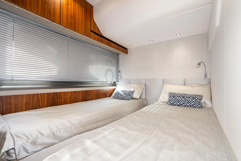 Slide: The Image of 2017 Sunseeker Manhattan 52 twin bed cabin with modern decor and wood accents. - 42