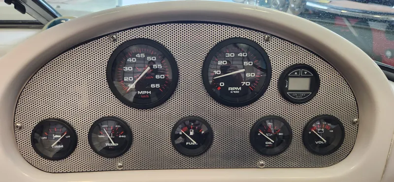 Slide: The Image of 2004 Chris-Craft Corsair 25 dashboard with speedometer and gauges. - 11