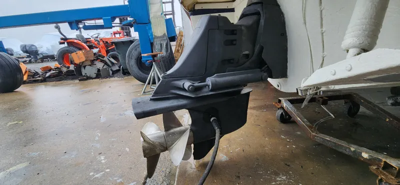 Slide: The Image of Close-up of a 2004 Chris-Craft Corsair 25 boat propeller in a workshop. - 23