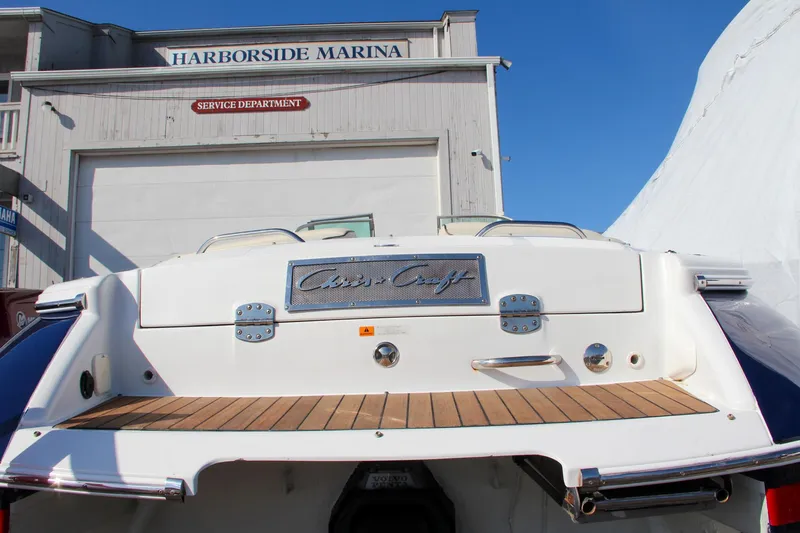 Slide: The Image of 2004 Chris-Craft Corsair 25 boat at Harborside Marina service department. - 31