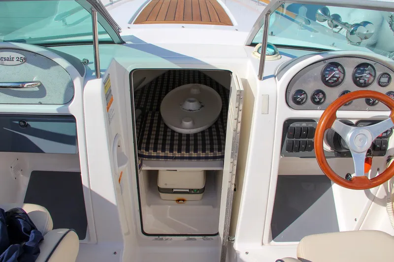 Slide: The Image of 2004 Chris-Craft Corsair 25 boat interior with cabin and helm. - 35