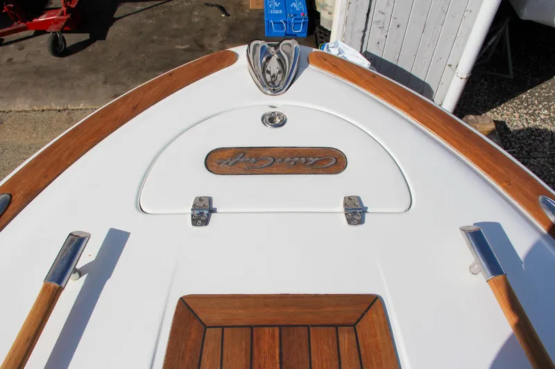 Slide: The Image of 2004 Chris-Craft Corsair 25 boat deck with wood accents. - 39