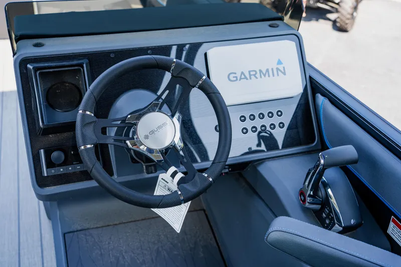 Slide: The Image of 2023 Manitou 24 EXPLORE SWITCHBACK boat dashboard with Garmin navigation system. - 4