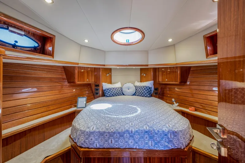 Slide: The Image of Luxurious cabin interior of 2023 Vento V40 Retro Classic Open yacht with wood paneling and cozy bed. - 23