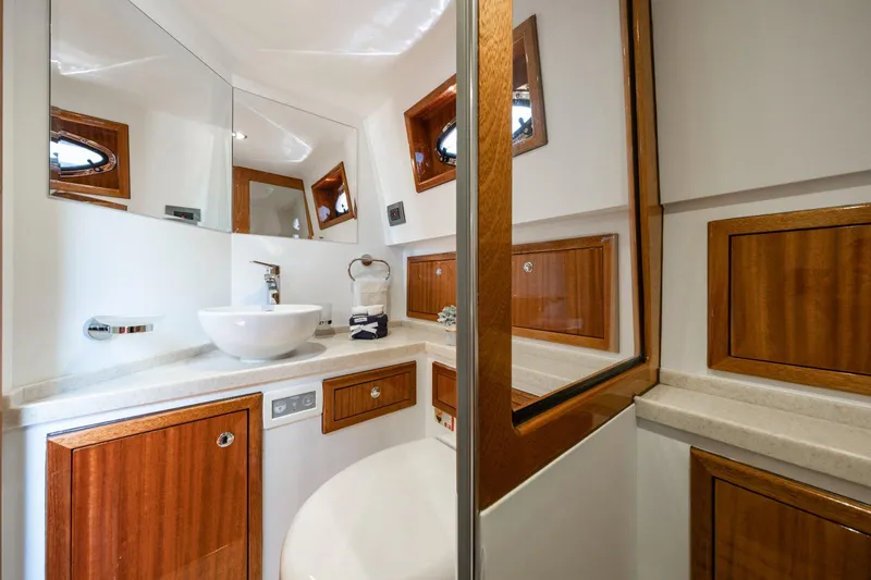 Slide: The Image of Luxurious bathroom in 2023 Vento V40 Retro Classic Open yacht with wooden cabinets and modern fixtures. - 25
