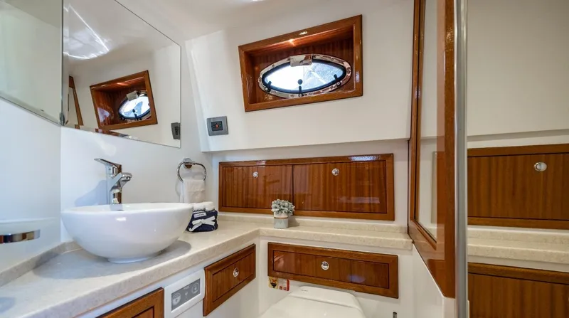 Slide: The Image of Elegant bathroom in 2023 Vento V40 Retro Classic Open yacht with wooden cabinets and modern fixtures. - 27