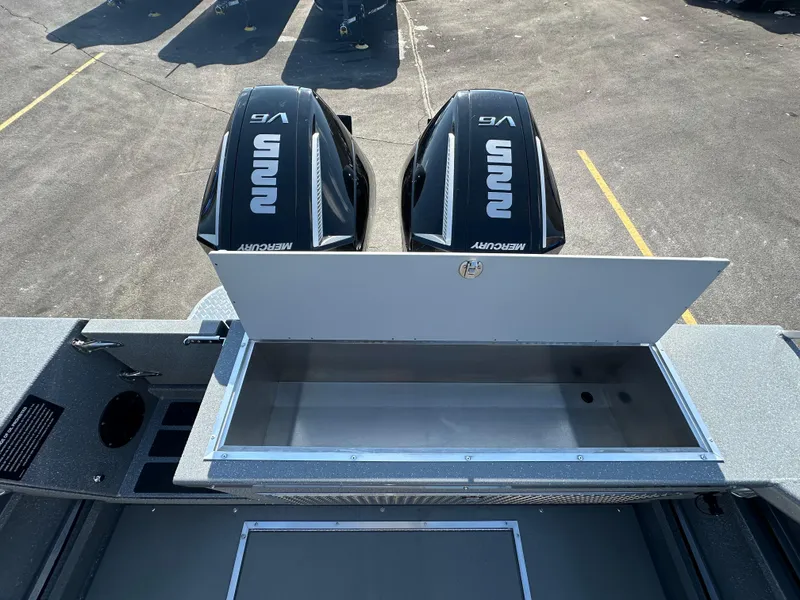 Slide: The Image of 2024 Spartan 260 Maximus Pro XL boat with dual V6 outboard engines. - 22