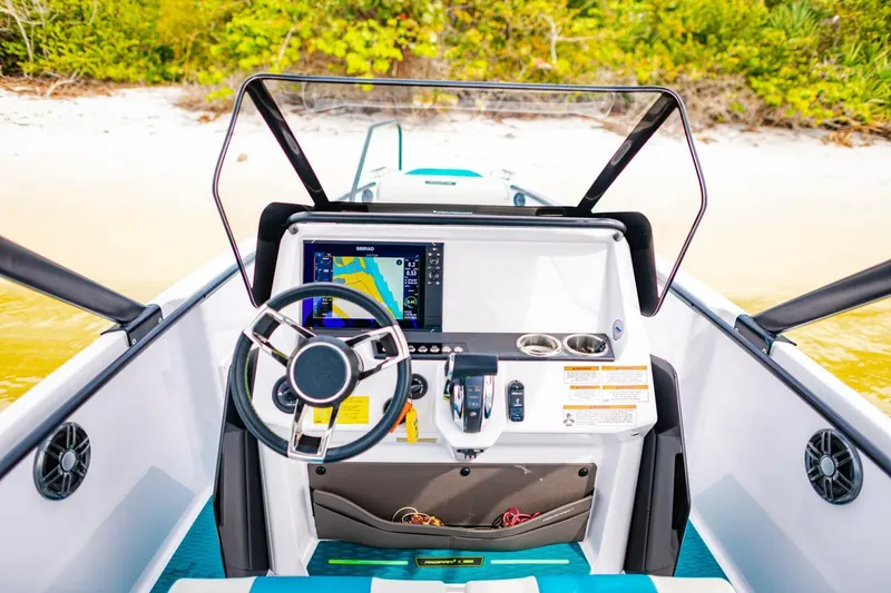 Slide: The Image of 2022 Axopar 22 Spyder x Jobe Revolve boat dashboard with navigation system. - 12