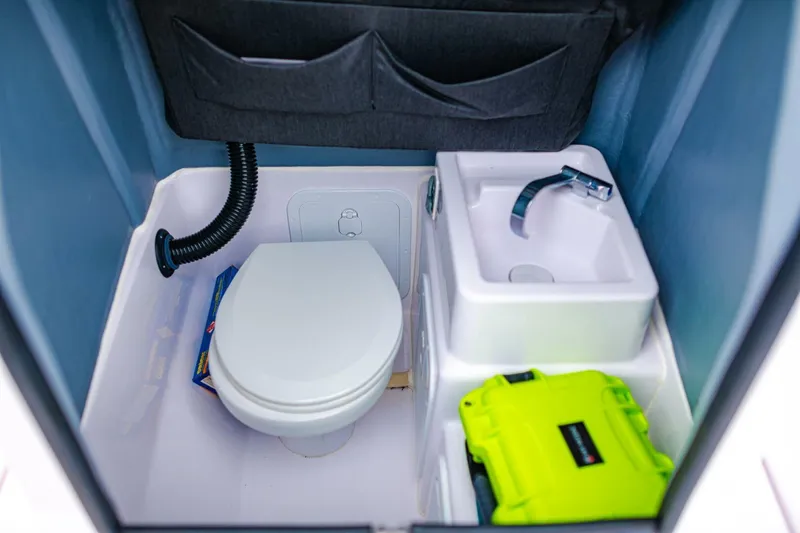 Slide: The Image of Compact bathroom in 2022 Axopar 22 Spyder x Jobe Revolve boat. - 18