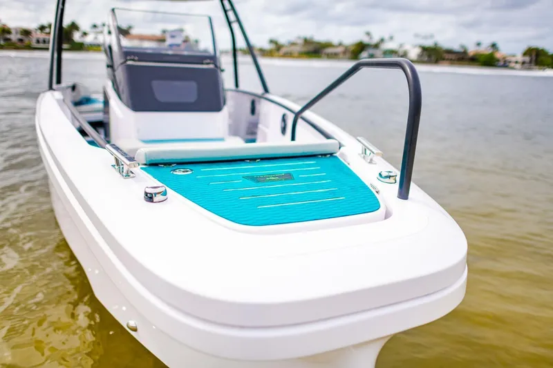 Slide: The Image of 2022 Axopar 22 Spyder x Jobe Revolve boat on water. - 8