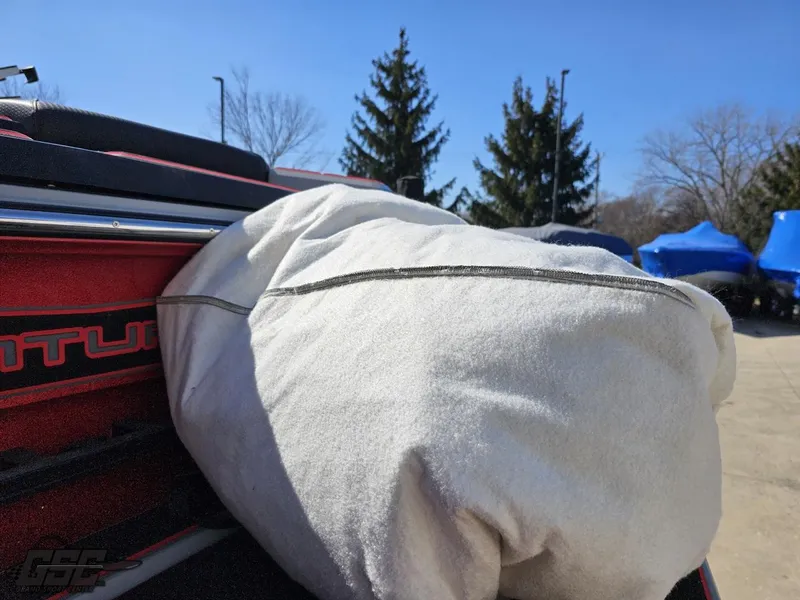 Slide: The Image of Centurion Ri265 2021 boat with a covered seat, outdoor storage area. - 20