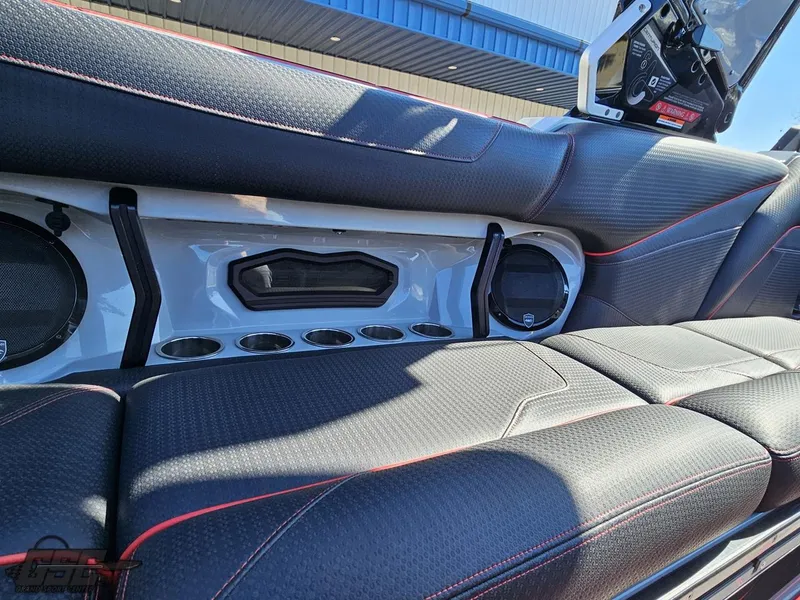 Slide: The Image of Interior seating and speaker system of a 2021 Centurion Ri265 boat. - 35